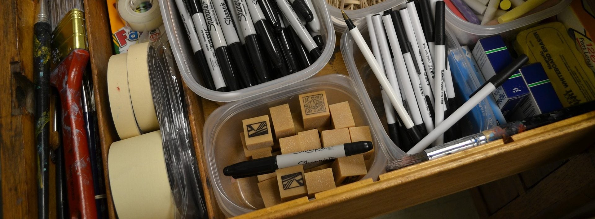 drawer full of assorted stationery supplies